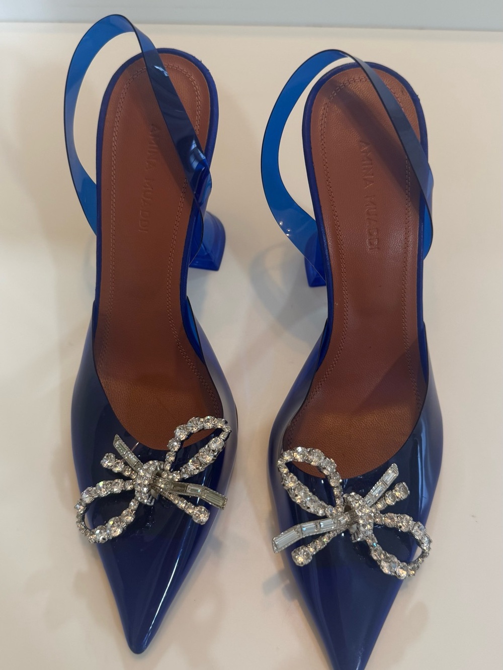 Amina Muaddi Royal Blue Pointed Slingback Heels with Crystal Bow
